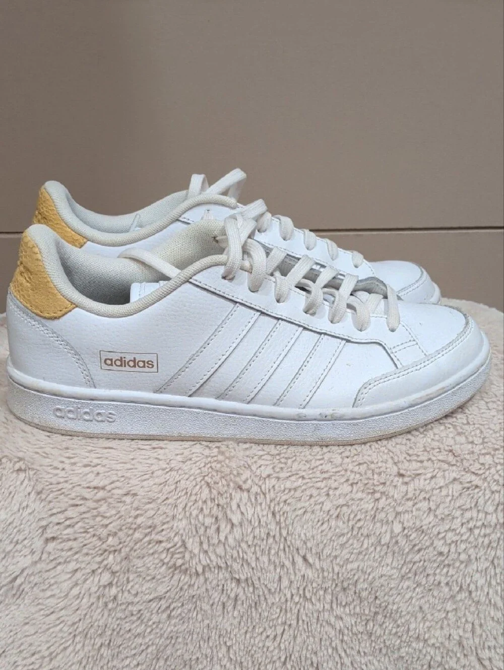 adidas Women’s White Sneakers with Pale Yellow Heel Patch